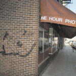 Graffiti outside of Ritz Camera on Orange Street in downtown Providence.
