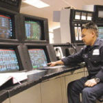 Power plants near sale May Phomsouvannady, lead operator at ManchesterStreet station, monitors the system.