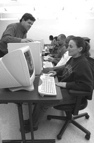 Students learn their skills throughcomputer monitors under thedirection of David Fugere. Students learn their skills through<br>computer monitors under the<br>direction of David Fugere.