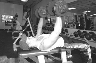 Nick Froucillo works with the weights at Apollo Fitness in Warwick. Nick Froucillo works with the weights at Apollo Fitness in Warwick.