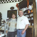 Dottie and Denis Auclair standbeside the market's selectionof specialty jams and other goods