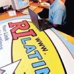 Latinos logging on Cesar E. Mullix founded RILatino.com,a Web site focusing on the Hispaniccommunity.