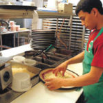 Pizza Pie-er has a recipe for success Melvin Leon puts toppings on a pizza at Pizza Pie-er'sWickenden Street location.