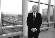 Providence Police Chief Dean M. Esserman at policeheadquarters, with Route 95 in the background.