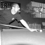 Bill goes up in smoke Jim Kelly smokes a cigarette at Nick-A-Nees, a barin Providence.