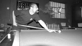 Jim Kelly smokes a cigarette at Nick-A-Nees, a barin Providence. Jim Kelly smokes a cigarette at Nick-A-Nees, a bar<br>in Providence.