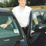 Luxury travel firm driven for success Eric Weiner, president of All OccasionTransportation, shows off one of hiscompany's vehicles