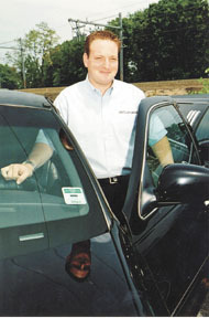 Eric Weiner, president of All OccasionTransportation, shows off one of hiscompany's vehicles Eric Weiner, president of All Occasion<br>Transportation, shows off one of his<br>company's vehicles