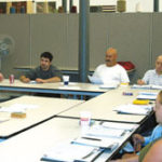 Businesses benefit as managers learn second language Steven Ussach teaches a language class at Quaker Fabrics in Fall River.