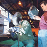 Training benefits employee, employer Tom Jackson fits steel as Dan Theroux Sr. supervisesthe Capco Steel Corp.'s training program.