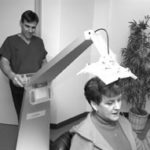 Cranston surgeon offers hair-raising technology Dr. Robert Leonard, a hair-restoration surgeon inCranston, operates the Luce LDS 100.