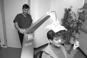 Dr. Robert Leonard, a hair-restoration surgeon inCranston, operates the Luce LDS 100. Dr. Robert Leonard, a hair-restoration surgeon in<br>Cranston, operates the Luce LDS 100.