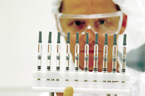 An Amgen lab technician. An Amgen lab technician.