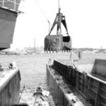 About 10,000 cubic yards of sand and mud aredredged per day in the Providence River project.