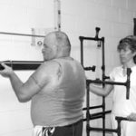 Mark Mitchell receives physical therapy treatmentfrom instructor Lisa Ritchie.