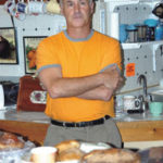 Tax revolt brewing Tony Demings, owner of BrooklynCoffee & Tea House, is loweringcoffee prices.