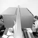 The cubicle’s evolution Dan Caiani, left, and Debra Sage work in adjoiningcubicles at Alga Plastics in Cranston.