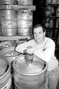 Brent Ryan, co-owner of Middletown-based Coastal Extreme Brewing Co.,poses in the keg room. Brent Ryan, co-owner of Middletown-<br>based Coastal Extreme Brewing Co.,<br>poses in the keg room.