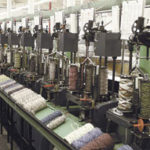 Innovative designs bolster manufacturing Colonial Mills in Pawtucket manufactures custombraided rugs.