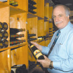 Elliott N. Fishbein of Town & Wine Spirits wouldrather not open on Sundays.