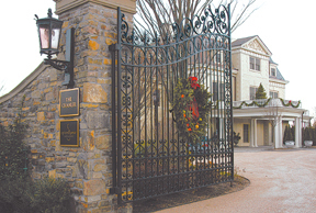 The iron-laced gates at The Chanler at Cliff Walkin Newport. The iron-laced gates at The Chanler at Cliff Walk<br>in Newport.