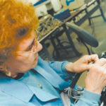 A worker wires a device at Electro Standards Laboratory,based in Cranston.