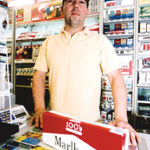 Cigarette tax hike a burning issue Richard Buckett, owner of Buckett'sGeneral Store in Riverside.