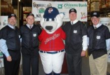 ANNOUNCING the campaign are, from left, John Wolfe, vice president of government and public affairs for Cox Communications; Lou Schwechheimer, vice president and general manager of the PawSox; Paws, the PawSox mascot; Joseph J. MarcAurele, president and CEO of Citizens Bank of Rhode Island; and Mike Gerhardt, interim executive director of the Rhode Island Community Food Bank. / 