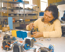 Emma Guzman of Crafford-Laserstar, East Providence, which faces increased manufacturing costs due to proposed federal funding cuts. Emma Guzman of Crafford-Laserstar, East Providence, which faces increased manufacturing costs due to proposed federal funding cuts.