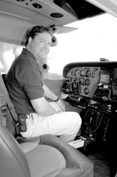 David Dinneen, owner of King Aviation in Mansfield, inspects the cockpit of a new plane. David Dinneen, owner of King Aviation in Mansfield, inspects the cockpit of a new plane.