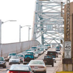 The Bourne Bridge as seen from the Cape Cod side. Massachusetts officials say traffic has snarled the tourism season early this summer. 