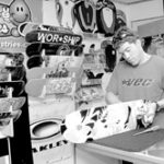 Hoyt Hottel, owner of Xtremely Board, an extreme sports store in Dartmouth, Mass., outfits a skateboard.