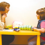 Speech pathologist Andrea Domingos works with Olivia Phillips, a 6-year-old from Coventry, at the South County Speech & Language Center in North Kingstown.