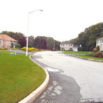 Big lots, big money A cul de sac in the Alpine Estates development in western Cranston, which calls for a minimum of one-half an acre of land.