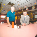 Food business cooks up acclaim Photo by Brian McDonaldBrothers Bill and Russ Morin help run the longtime family business of Morin's Diners, a collection of restaurant and catering operations. Here the two are pictured at their Attleboro diner on South Main Street.