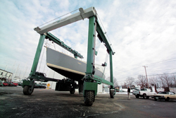 <b>Photo by Brian McDonald</b>David MacBain, co-owner of New England Boatworks, inspects a boat lift and transportation machine. <b>Photo by Brian McDonald</b><br>David MacBain, co-owner of New England Boatworks, inspects a boat lift and transportation machine.