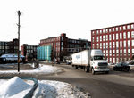 Milling about in Woonsocket Photo by Frank MullinWoonsocket's newest target for future industrial development sits at the city's entrance on Hamlet Avenue - 17 acres of waterfront land, mostly the old ACS Industries mill complex. The heavily contaminated site could cost $3 million to clean up.