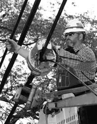 <b>Photo by Bloomberg News</b>A Verizon worker strings fiber-optic cable in Fairfax County, Va. Th telephone carrier has seen increased competition in Rhode Island from rival providers. <b>Photo by Bloomberg News</b><br>A Verizon worker strings fiber-optic cable in Fairfax County, Va. Th telephone carrier has seen increased competition in Rhode Island from rival providers.
