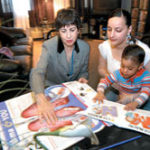 Insurer praised for personal touch Photo by Frank MullinKatie King, left, an asthma nurse with Neighborhood Health Plan of R.I., offers advice to Odette Rivera, of Providence, for treatment of her 3-year-old. Such hands-on outreach is an integral component of the insurer's approach to health care.