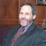 Seeking to strengthen the mental health safety net Photo by Brian McDonaldProvidence Center President Dale Klatzker says his organization would suffer if proposed Medicaid cuts are approved.