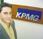 NEW RECRUIT: Aaron Holzinger was hired by KPMG in May, shortly after graduating from PC.