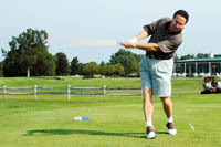 <b>Vinnie Sandonato</b> tees off at the Alpine Country Club last Monday in a charity golf tournament. <b>Vinnie Sandonato</b> tees off at the Alpine Country Club last Monday in a charity golf tournament.