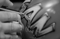 <b>Personal Touch</b> Jerry Brock of AFD Custom Air Brush Studio in Warwick can customize just about any object. <b>Personal Touch</b> Jerry Brock of AFD Custom Air Brush Studio in Warwick can customize just about any object.