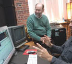 Making TV for multimedia world PBN photo/Stephanie Ewens
Joshua B. Backer, right, a digital filmmaker, demos a Tango Pix film as Curt Worden, president of the company, looks on.
