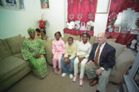 Photo Courtesy R.I. Bar Association
<b>PHILIP M. WEINSTEIN,</b> right, president of the Rhode Island Bar Association, is providing free legal assistance to Nancy Karlor, left, who is seeking legal guardianship of her grandchildren Malaica, Mario and Gladys Gaye. Photo Courtesy R.I. Bar Association<br><br>
<b>PHILIP M. WEINSTEIN,</b> right, president of the Rhode Island Bar Association, is providing free legal assistance to Nancy Karlor, left, who is seeking legal guardianship of her grandchildren Malaica, Mario and Gladys Gaye.