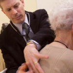 PBN photo/Stephanie Ewens
Dr. Lewis Weiner checks patient Mary Tarski during a recent follow-up visit. Weiner has cared for Tarski for the past 15 years.