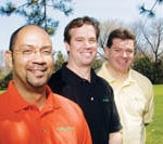 PBN photo/Stephanie Ewens
RICK SCHAD, center, a graphic designer and avid golfer, came up with the concept of a belt with a detachable ball marker and divot tool while playing golf one day. His partners, Akim Msumba, left, and Stephen Walsh, have helped him commercialize the invention.