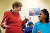 PBN photo/Stephanie Ewens<b>Brenda Dann-Messier</b> gets excited for Sonya Vazquez of Pawtucket, who has been studying at Dorcas Place for a couple of months. PBN photo/Stephanie EwensBrenda Dann-Messier gets excited for Sonya Vazquez of Pawtucket, who has been studying at Dorcas Place for a couple of months.