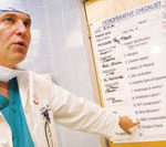 Miriam adapts checklist for OR safety PBN Staff photo/Stephanie Ewens
Dr. Harry Sax, chief surgeon at The Miriam Hospital, explains a checklist of items that help prioritize operating room procedures.