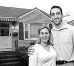 PBN Staff photo/Stephanie Ewens
Home Sweet Home: Michelle Midkiff and her husband, Brian, bought a home in East Providence last year with the help of Rhode Island Housing and Bank Rhode Island.